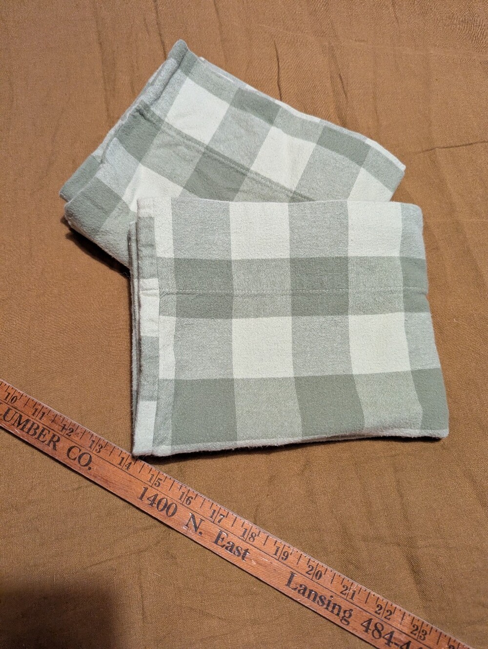 pair of LL Bean flannel green Buffalo check pillowcases